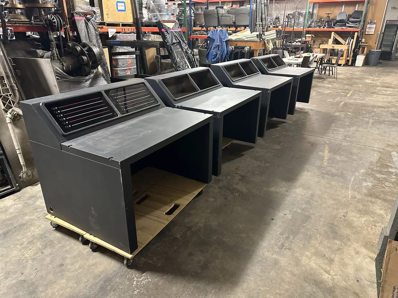A command console on the Gold Room Props warehouse floor